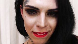 Tattooed tranny Gaby Ink tugging her big swollen cock