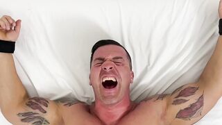 Bound mature hunk laughs while he receives tickling torment