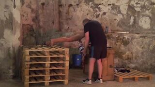 Mature master dominates a younger man and restrains his cock
