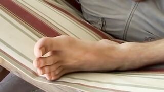Sweet young Ryan Connors is enjoying himself with some toe sucking and jerk off fun