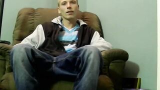 Young American strokes his dick and cum blasts