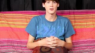 Young man jizzes all over his chest after steamy interview