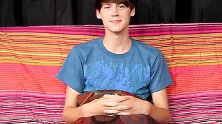 Young man jizzes all over his chest after steamy interview