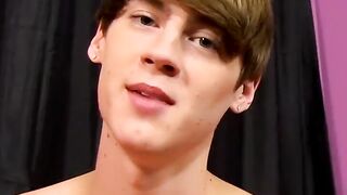 Young man jizzes all over his chest after steamy interview