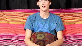 Young man jizzes all over his chest after steamy interview