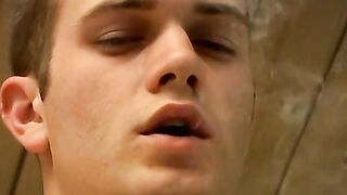 Hardcore smoker Bryce Corbin jerks in bed and blows warm hot cum on his chest