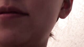 Japanese dollface tops a cup off with her pee and records it