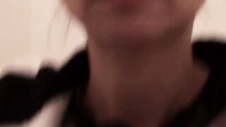 Japanese dollface tops a cup off with her pee and records it