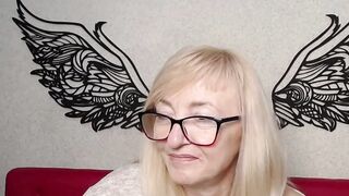 Blonde MILF with glasses on webcam