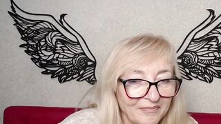 Blonde MILF with glasses on webcam