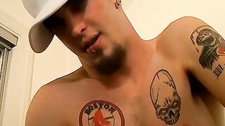 Muscled inked Axel had a tasty mountain jizz after wanking his cock