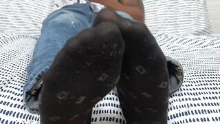 Hunky Dallas shows off his nice size twelve feet while relaxing