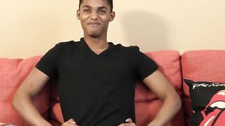 Dark young fellow gives a meeting and invigorates himself