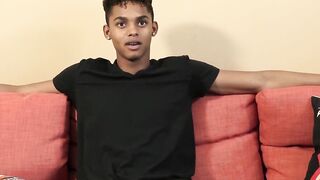Dark young fellow gives a meeting and invigorates himself