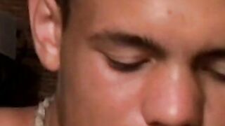 Handsome guy with necklace blow his smoke and spills his cum