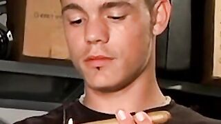 Handsome guy with necklace blow his smoke and spills his cum