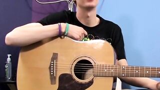 Before dick stroking and cupping a young man plays the guitar