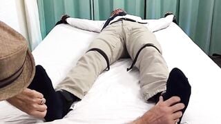 Hunky Leon Carrera moaned and bound in a tickling torment by the master