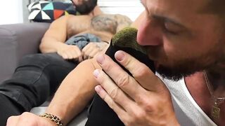 Muscular Zeek P has his feet sucked and worshiped by hunky Ray H