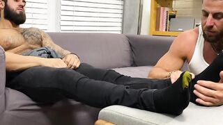 Muscular Zeek P has his feet sucked and worshiped by hunky Ray H