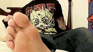 Blinks strokes his hard dick and spews his load out all over his foot