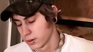 Blonde Carl plays cock while chain smokin