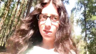 Hot with glasses walks into outdoor and shows breasts and snatch