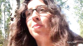 Hot with glasses walks into outdoor and shows breasts and snatch
