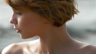 Short haired bombshell Ariel A flaunts her sultry body on the shoreline