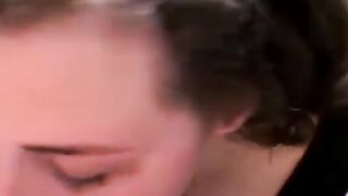 Curvy amateur babe with natural tits sucking two big dicks