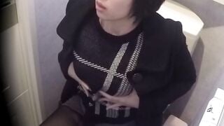 Hairy pussy babe caught masturbating in public bathroom