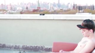 Adorable Alex Killborn stroked his cock passionately on the rooftop