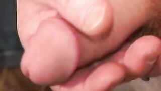Tattooed amateur jerks off his rock hard cock before cumshot