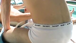 Zack Randall gives athletic Mike Roberts handjob by the pool