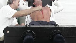 Tied up stud with tattoos has his toes and feet tickled