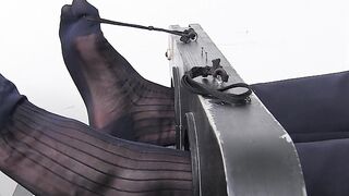 Tied up stud with tattoos has his toes and feet tickled