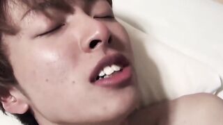 Youthful Japanese is serving his daddy by giving him a sensual caress