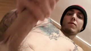 Tattooed young thug playing with his stiff dick on camera