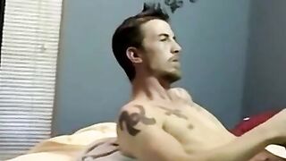 Inked amateur strokes his cock and gets blown by mature gay