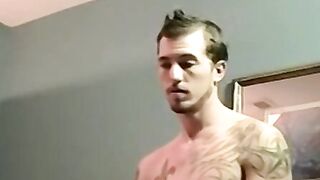 Inked amateur strokes his cock and gets blown by mature gay