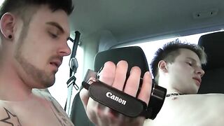 Gays drive in a car while anally fucking and video recording