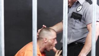 Prison guard Riley Mitchel dominates an inmate by mouthfucking him