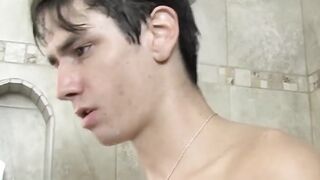 While wanking off in the shower wild twink Nathan stuffs dildo