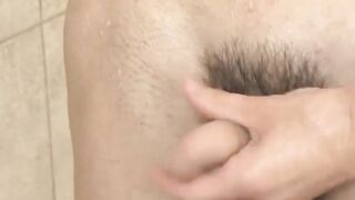 While wanking off in the shower wild twink Nathan stuffs dildo