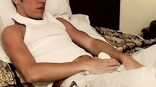 Sexy Brady wanks his thick dick while his toes play against each other