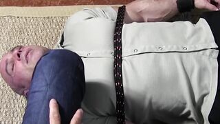 Muscular bound man tormented with smelly masters feet