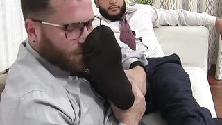 Latino hunk has his feet massaged and licked by bearded gay