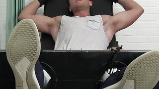 Hunk laughs while man tickles his juicy toes with gloves
