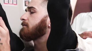 Doctor masturbates while bearded patient licks his feet