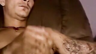 Tattooed amateur jock wanks off his fat cock and cums